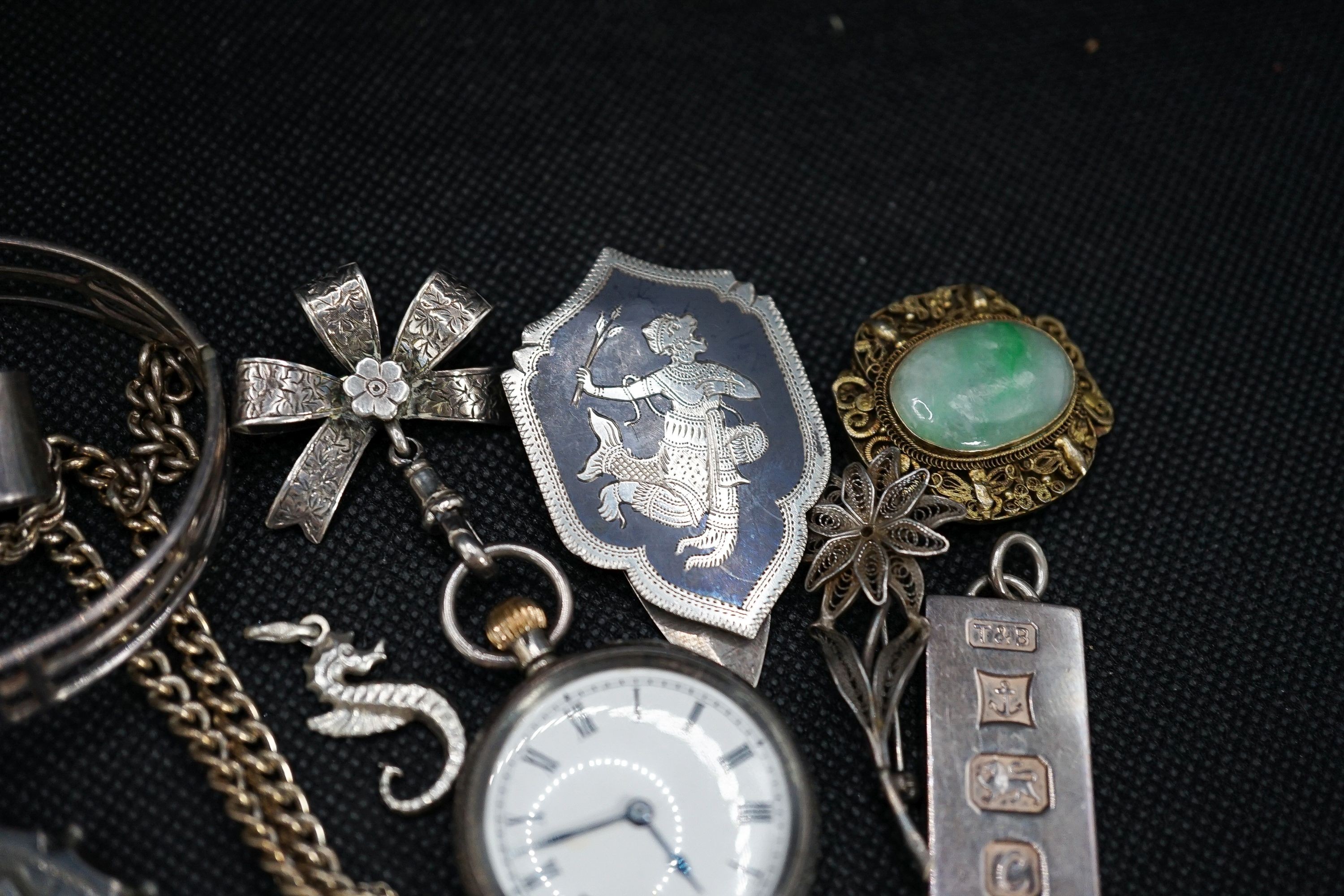 A silver fob watch, a late Victorian silver oval locket and other items of minor jewellery.